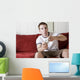Gamer on the couch Wall Mural