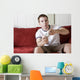 Gamer on the couch Wall Mural