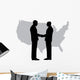 A silhouette of men handshaking with map of USA Wall Decal
