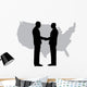 A silhouette of men handshaking with map of USA Wall Decal
