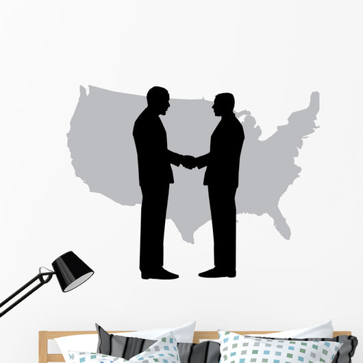 A silhouette of men handshaking with map of USA Wall Decal