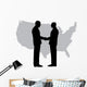A silhouette of men handshaking with map of USA Wall Decal