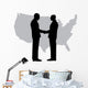 A silhouette of men handshaking with map of USA Wall Decal