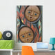 Detail of a North American Totem Pole with people faces Wall Mural