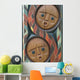 Detail of a North American Totem Pole with people faces Wall Mural