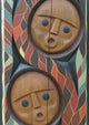 Detail of a North American Totem Pole with people faces Wall Mural