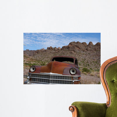 Rusted Classic Car Desert Wall Mural shown on a wall