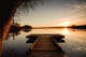The bridge to the lake under the sunset Wall Mural