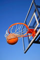 Basketball Shot Falling Through the Net, Blue Sky Wall Mural