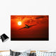 Airplane Flying In Sunrise/Sunset Wall Mural