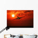 Airplane Flying In Sunrise/Sunset Wall Mural