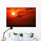 Airplane Flying In Sunrise/Sunset Wall Mural