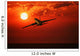 Airplane Flying In Sunrise/Sunset Wall Mural