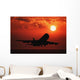 Airplane Landing At Sunset Wall Mural
