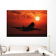 Airplane Landing At Sunset Wall Mural