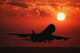 Airplane Landing At Sunset Wall Mural