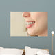 Girl smiles with braces Wall Mural