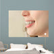 Girl smiles with braces Wall Mural