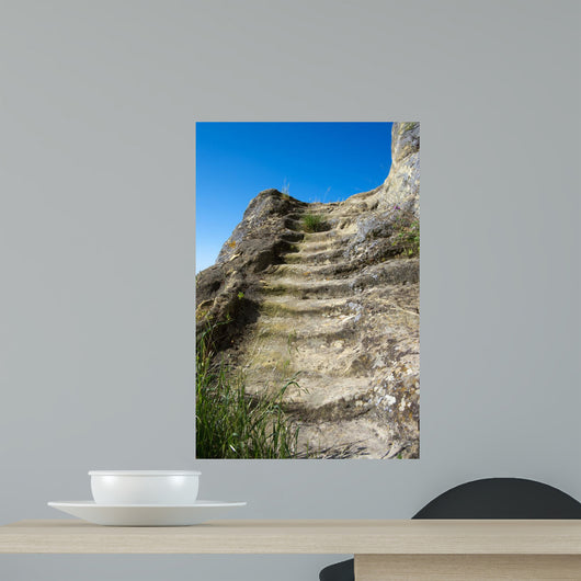Steps carved in rock to reach the sky (stairway to Heaven Wall Mural