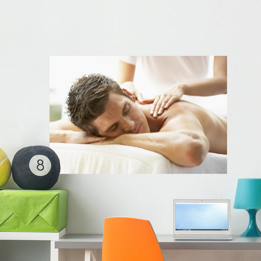 Young Man Enjoying Massage Wall Decal
