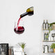 Pouring red wine into a glass Wall Decal