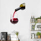 Pouring red wine into a glass Wall Decal