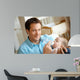 Man Feeding Baby Wall Decal