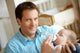 Man Feeding Baby Wall Decal