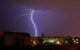 Lightning over City during Wall Decal
