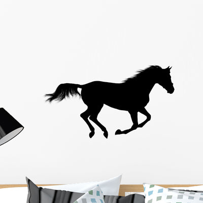 Silhouette Galloping Stallion Wall Decal shown on a wall