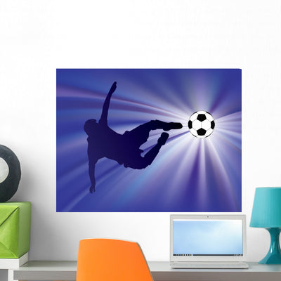 Football Player Kicks Soccer Wall Decal shown on a wall