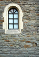 Arch Window in Stone Wall Wall Mural