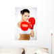 Young beautiful woman during fitness time and boxing Wall Decal