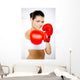 Young beautiful woman during fitness time and boxing Wall Decal