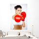 Young beautiful woman during fitness time and boxing Wall Decal