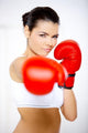 Young beautiful woman during fitness time and boxing Wall Decal