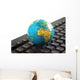 Africa on toy globe over keyboard Wall Decal