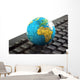 Africa on toy globe over keyboard Wall Decal