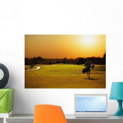 Golfer Walking Golf Course Wall Mural shown on a wall