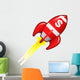 Dollar sign currency symbol on red retro rocket ship Wall Decal