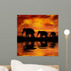 Elephants on a Beautiful Sunset Background Wall Mural