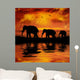 Elephants on a Beautiful Sunset Background Wall Mural