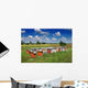Bee hives in the meadow in summer Wall Mural