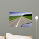 Fast moving car on road Wall Mural