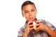 Adorable Hispanic Boy Eating a Large Red Apple Wall Decal