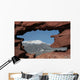 Pikes Peak mountain as seen through a hole in red rocks at Garde Wall Mural