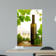 White wine and grapevine on white background Wall Mural