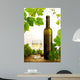 White wine and grapevine on white background Wall Mural