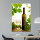 White wine and grapevine on white background Wall Mural
