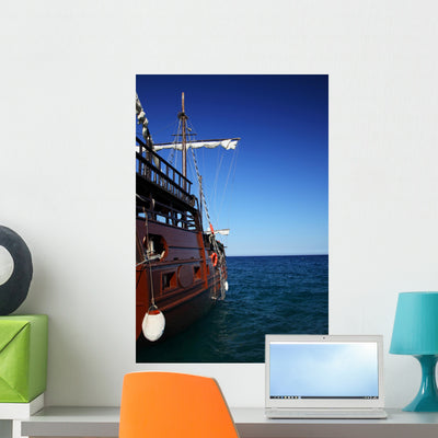 Sailing Ship Wall Mural shown on a wall
